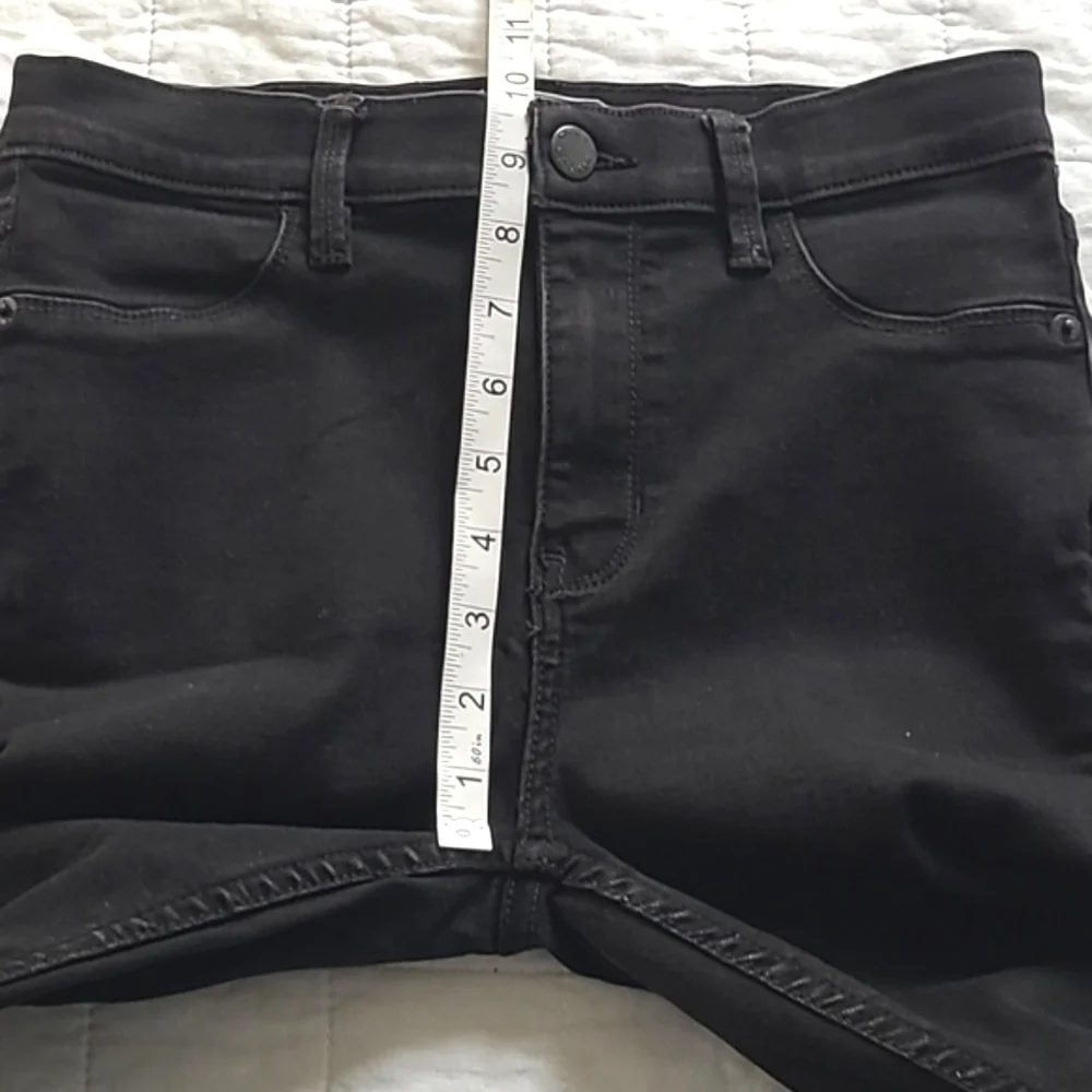 Free People high rise super skinny Plain black stretch jeans Size 27